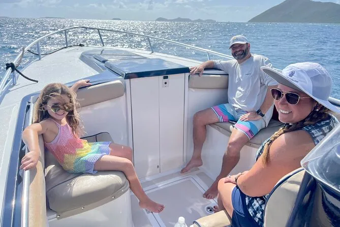 Snorkelers drifting over a coral reef on a private BVI snorkeling charter from Tortola, British Virgin Islands
